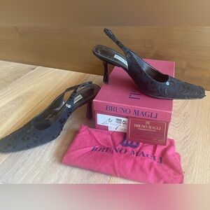 Bruno Magli sequin and embroidery covered stilettos.